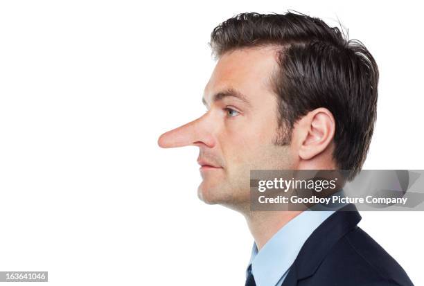 profile of a dishonest businessman - long nose stock pictures, royalty-free photos & images