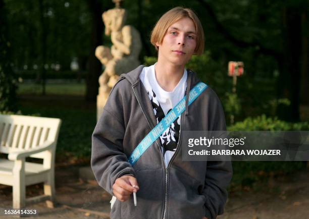 Bogdan Marynenko, 19-year-old construction worker, poses for a photo at Lazienki Park in Warsaw, Poland, on August 2, 2023. The war of Russia against...