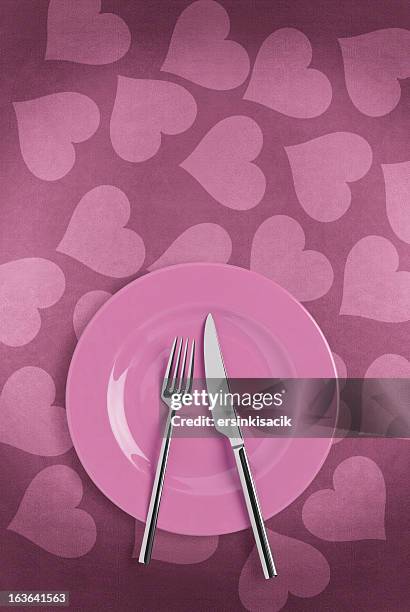 table setting on heart shape tablecloth - valentines day dinner stock pictures, royalty-free photos & images