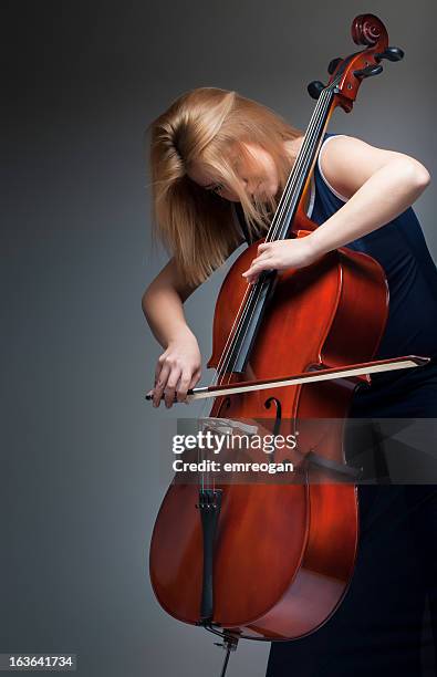 musician playing cello - musical instrument string stock pictures, royalty-free photos & images