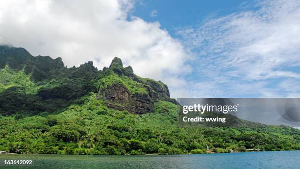 island of moorea featuring cooks bay. - moorea stock pictures, royalty-free photos & images