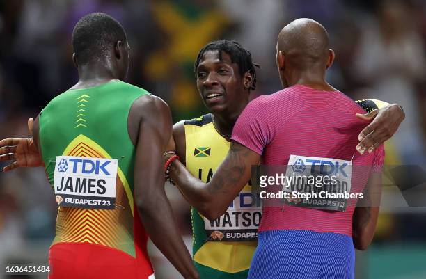 Kirani James of Team Grenada, Antonio Watson of Team Jamaica and Vernon Norwood of Team United States react after competing in the Men's 400m Final...