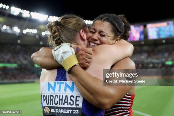 Anna Purchase of Team Great Britain and Camryn Rogers of Team Canada react after competing in the Women's Hammer Throw Final during day six of the...