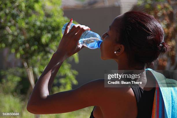 https://media.gettyimages.com/id/163650664/photo/young-woman-drinking-water-from-a-bottle-johannesburg-south-africa.jpg?s=612x612&w=gi&k=20&c=LM0qPvZVNW9MzV_PHqi5Qpy2ndNUjlRtlSnaW3SW5CM=