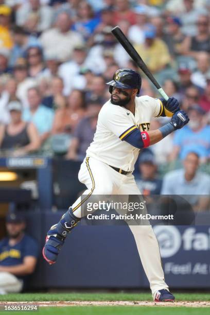Carlos Santana of the Milwaukee Brewers bats in the first inning against the Minnesota Twins at American Family Field on August 23, 2023 in...