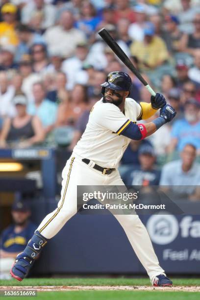 Carlos Santana of the Milwaukee Brewers bats in the first inning against the Minnesota Twins at American Family Field on August 23, 2023 in...