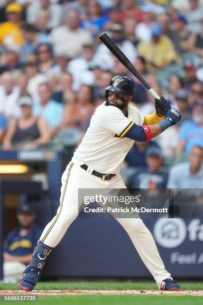 Carlos Santana of the Milwaukee Brewers bats in the first inning against the Minnesota Twins at American Family Field on August 23, 2023 in...