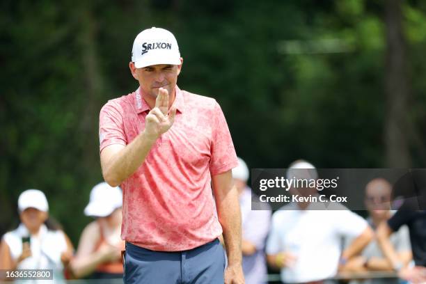 Keegan Bradley of the United States lines up a putt on the first green during the first round of the TOUR Championship at East Lake Golf Club on...