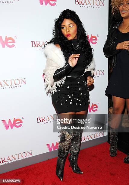 Recording Artist Lil' Kim attends the "Braxton Family Values" Season Three premiere party at STK Rooftop on March 13, 2013 in New York City.