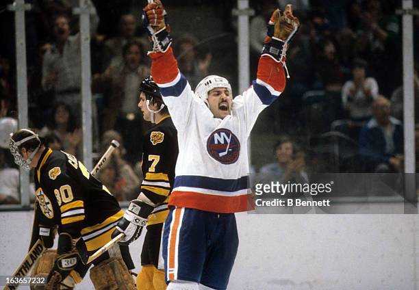 John Tonelli of the New York Islanders celebrates on the ice during the 1980 Quarter Finals against the Boston Bruins in April, 1980 at the Nassau...