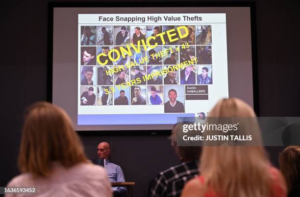 An example of cctv images of a criminal is displayed on a slide during a media event at a Thames Valley Police training facility in Sulhamstead near...