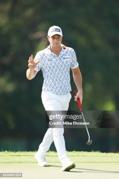 Viktor Hovland of Norway reacts on the 13th green during the first round of the TOUR Championship at East Lake Golf Club on August 24, 2023 in...