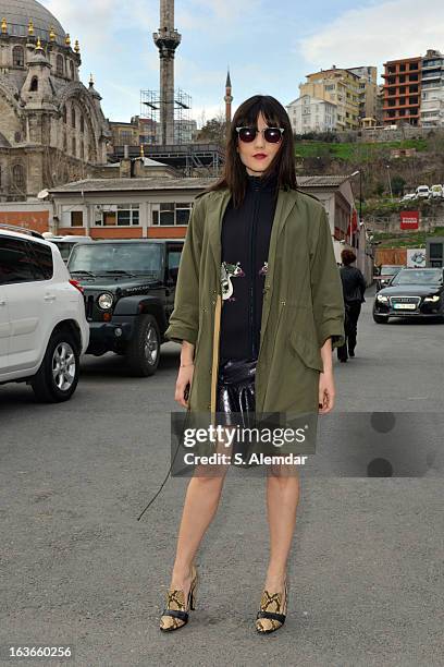 Fashion week guest wearing Celine shoes, Elizabeth and James coat and Safilo Vintage sunglasses is seen during Mercedes-Benz Fashion Week Istanbul...