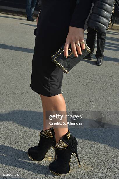 Fashion week guest wearing Top Shop dress, From Rome shoes, and CC Skye bag is seen during Mercedes-Benz Fashion Week Istanbul Fall/Winter 2013/14 at...