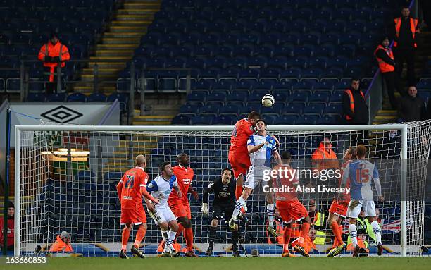 Scott Dann of Blackburn competes with Mark Beevers of Millwall during the FA Cup sponsored by Budweiser Sixth Round Replay match between Blackburn...