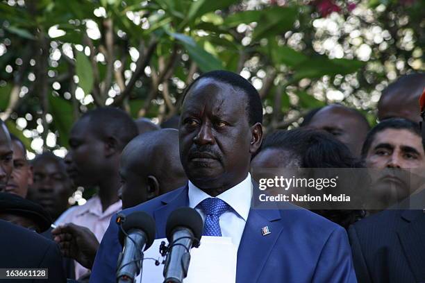 Presidential candidate, Raila Odinga, flanked by Moses Wetangula address the media on March 9, 2013 in Nairobi, Kenya. He said that the coalition is...