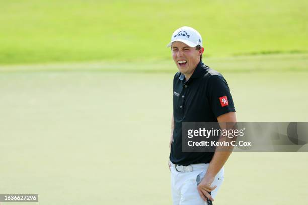 Matthew Fitzpatrick of England reacts on the 18th green during the first round of the TOUR Championship at East Lake Golf Club on August 24, 2023 in...
