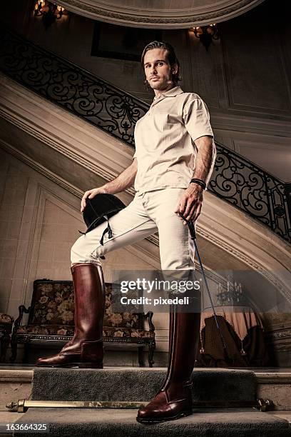 young rich man - riding boot stock pictures, royalty-free photos & images