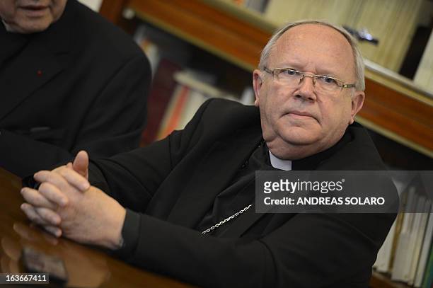 French cardinal Jean-Pierre Ricard listens during a press conference the day after Pope Francis was elected on March 14, 2013 in Rome. Pope Francis...
