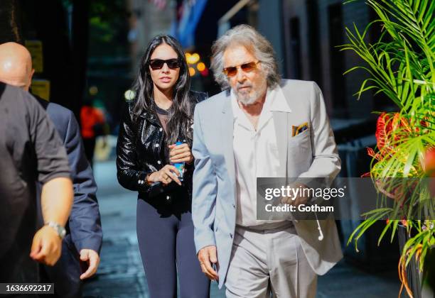 Noor Alfallah and Al Pacino arrive for a music video shoot with Bad Bunny on August 24, 2023 in New York City.