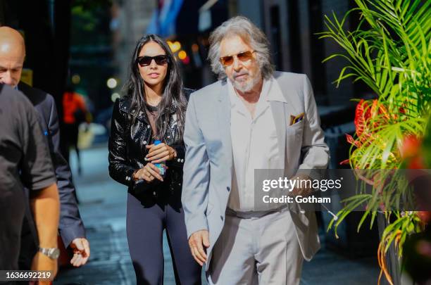 Noor Alfallah and Al Pacino arrive for a music video shoot with Bad Bunny on August 24, 2023 in New York City.