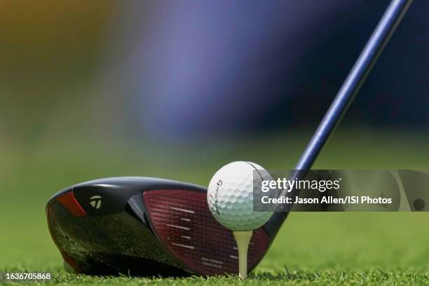 Rory McIlroy of Northern Ireland lines up his 3 wood behind the ball before teeing off on hole at East Lake Golf Club on August 24, 2023 in Atlanta,...