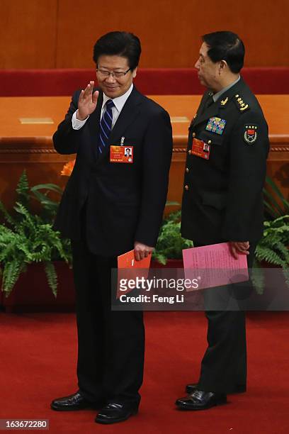 Communist Party Secretary of Xinjiang Uygur Autonomous Region Zhang Chunxian and Chinese vice chairman of the Central Military Commission Fan...