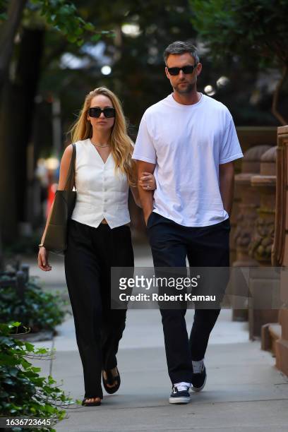 Jennifer Lawrence and Cooke Maroney seen out and about in Manhattan on August 22, 2023 in New York City.
