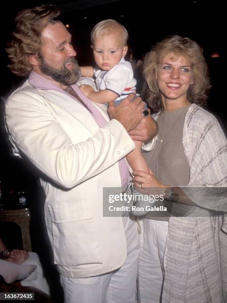 Actor Dan Haggerty, wife Samantha and son Dylan on March 21, 1985 sighting at the Beverly Hills Hotel in Beverly Hills, California.