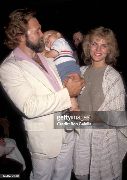 Actor Dan Haggerty, wife Samantha and son Dylan on March 21, 1985 sighting at the Beverly Hills Hotel in Beverly Hills, California.