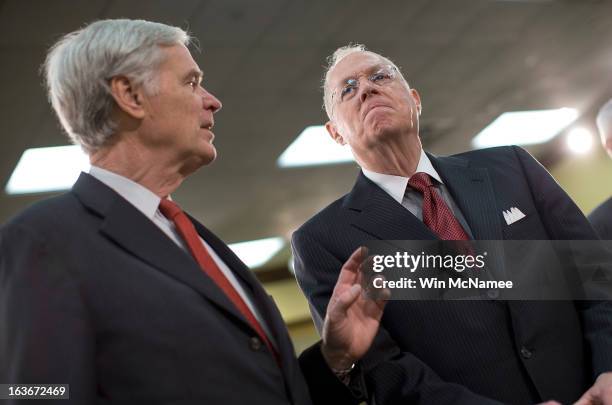 Supreme Court Associate Justice Anthony Kennedy talks with Rep. Ander Crenshaw before the start of a hearing on Capitol Hill March 14, 2013 in...