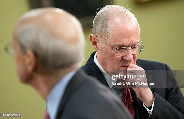 Supreme Court Associate Justices Anthony Kennedy and Stephen Breyer await the start of a hearing on Capitol Hill March 14, 2013 in Washington, DC....