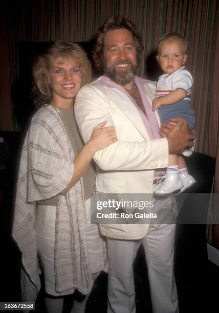 Actor Dan Haggerty, wife Samantha and son Dylan on March 21, 1985 sighting at the Beverly Hills Hotel in Beverly Hills, California.