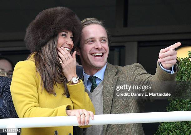 Pippa Middleton and friend Tom Kingston watch the Queens Mother Champion Steeple Chase on day 3 of the Cheltenham Festival at Cheltenham Racecourse...