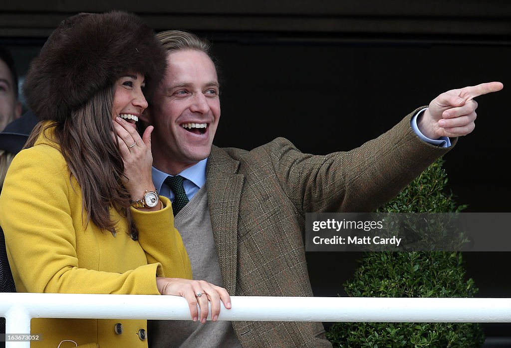 Visitors Enjoy The Racing At The Cheltenham Festival 2013