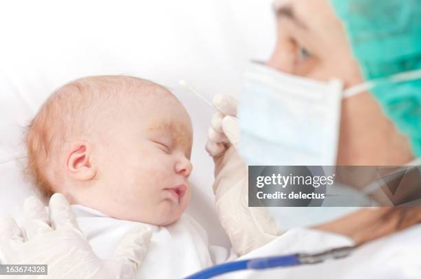 baby at the doctor - seborrheic dermatitis stock pictures, royalty-free photos & images