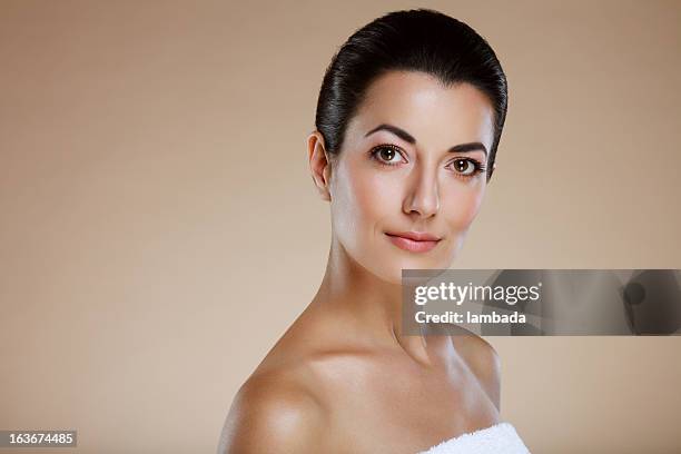 middle aged beautiful woman - woman on plain background stock pictures, royalty-free photos & images