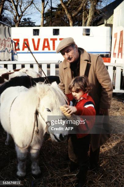 An archive photo taken on 1973 shows French clown and circus operator Achille Zavatta and his son Eric in Paris. Achille Zavatta started performing...