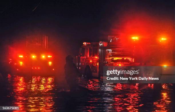 Massive fires destroyed 110 homes in Breezy Point, Brooklyn, one of the most devastating fires as a result of Hurricane Sandy. Pictures taken during...