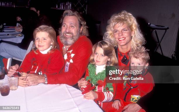 Actor Dan Haggerty, wife Samantha, son Dylan, daughter Megan and son Cody attend the 60th Annual Hollywood Christmas Parade on December 1, 1991 at...