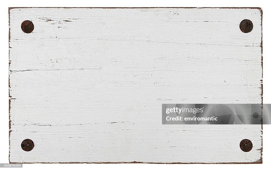 White grunge wood board with four bolts.