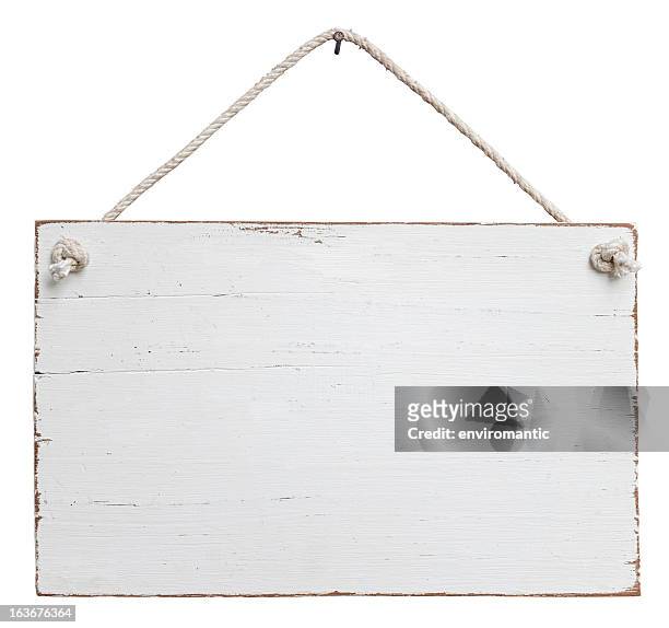 old, white weathered signboard hanging by a string - placard stock pictures, royalty-free photos & images