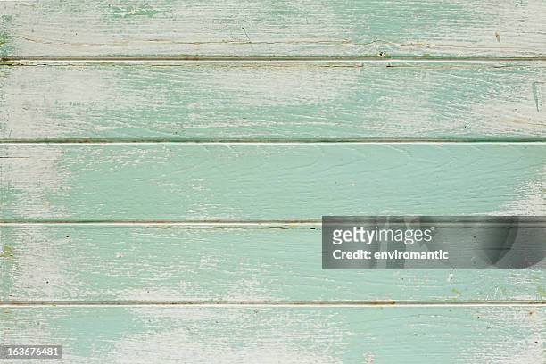 old painted wooden board background. - groenhout stockfoto's en -beelden