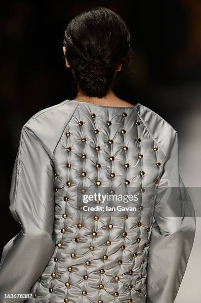 Model walks the runway at the Mercedes-Benz Presents Ozlem Kaya show during Mercedes-Benz Fashion Week Istanbul Fall/Winter 2013/14 at Antrepo 3 on...