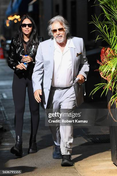 Noor Alfallah and Al Pacino seen on a film shoot in Manhattan on August 24, 2023 in New York City.