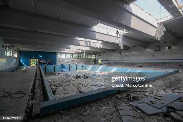 View of the swimming pool of the Delphinia Sporting Club, inside the Caivano Green Park, which recently made headlines, as the site of the rape of...