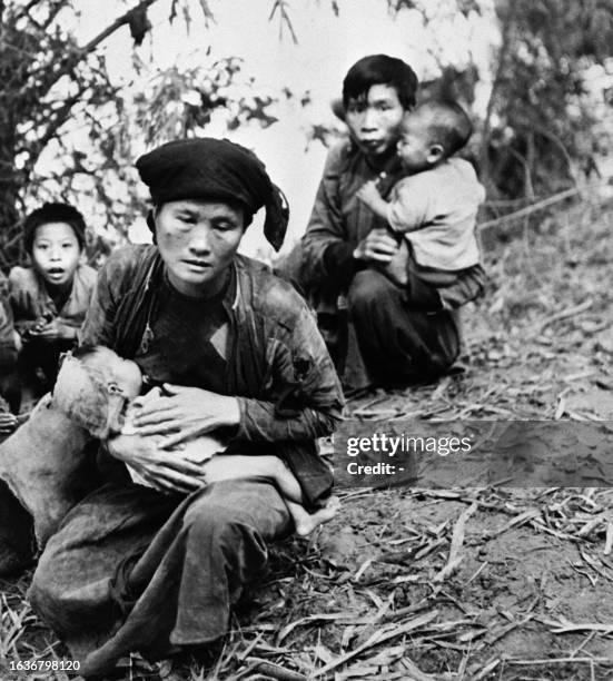 Civilians hide on the road to Saigon, in the Gulf of Tonkin during the French military operations in the ZONE in Lang Son, in October 1950. During...