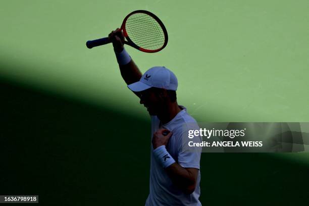 Britain's Andy Murray reacts while facing Bulgaria's Grigor Dimitrov during the US Open tennis tournament men's singles second round match at the...