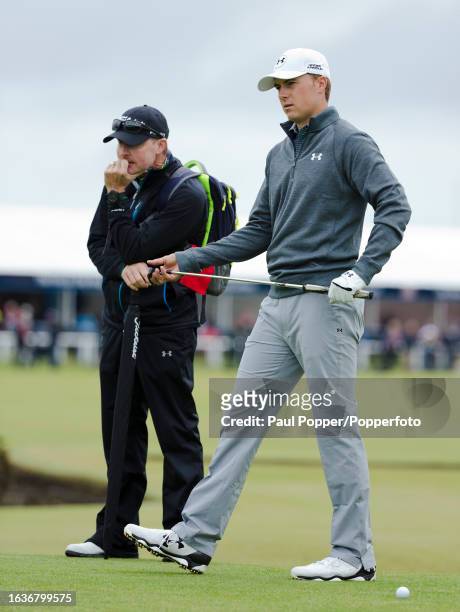 Jordan Spieth of the United States with his coach Cameron McCormick during the final practice day before the 144th Open Championship at the Old...