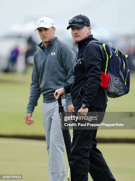 Jordan Spieth of the United States with his coach Cameron McCormick during the final practice day before the 144th Open Championship at the Old...